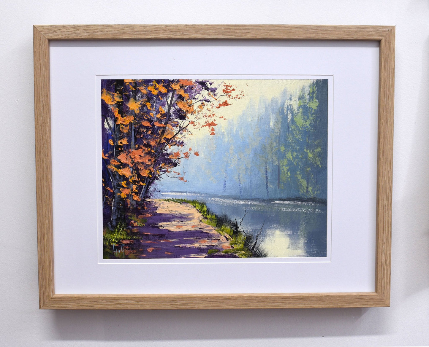 Framed Autumn lake painting by Graham Gercken